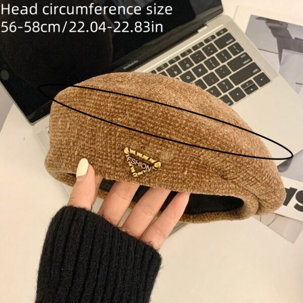 The Parisian Winter Beret Hat by Newness in a rich burgundy color, styled effortlessly with a classic autumn outfit.