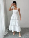 Effortlessly chic Newness Summer Solstice Lace Trim Midi Dress perfect for summer soirées and vacations Model wears a midi length dress with delicate lace trim