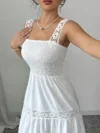 Effortlessly chic Newness Summer Solstice Lace Trim Midi Dress perfect for summer soirées and vacations Model wears a midi length dress with delicate lace trim