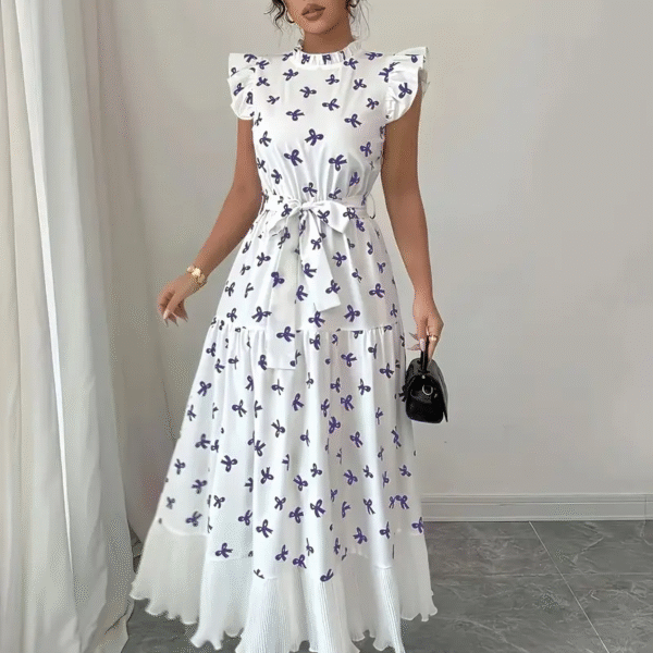 Model wearing a chic butterfly print dress, perfect for summer. The dress is made of lightweight polyester and floats beautifully.