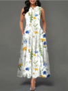 Model wearing the Newness Summer Breeze floral print dress a versatile and comfortable dress with pockets perfect for any season