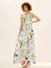 Model wearing the Newness Summer Breeze floral print dress a versatile and comfortable dress with pockets perfect for any season