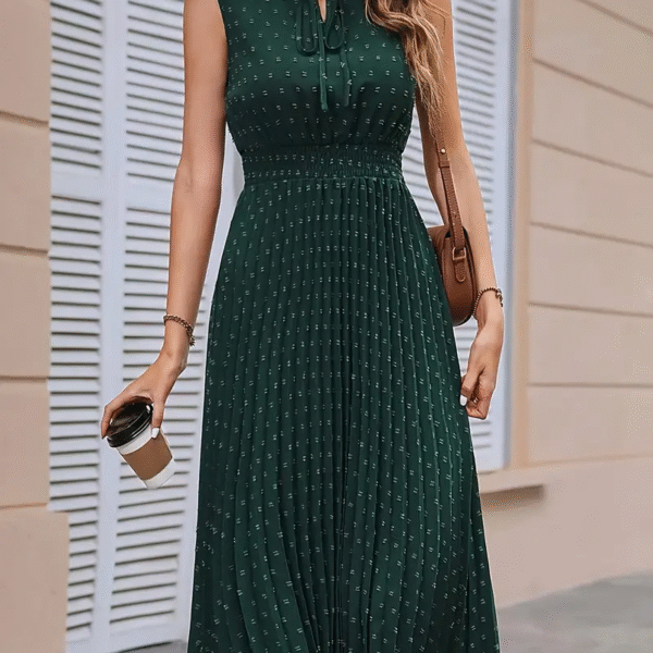 Emerald Elegance Pleated Midi Dress by Newness A chic flowy emerald green midi dress with pleats perfect for any occasion