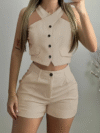 Stylish and comfortable Cairo Womens Vest Shorts Set by Newness Model wears a two piece outfit featuring a sleeveless vest and high waisted shorts perfect for a casual yet chic look