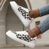Newness Safari Chic Leopard Print Sneakers Stylish and comfortable leopard print sneakers perfect for any occasion