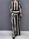 The Newness Cairo Striped Two Piece Set A stylish and versatile two piece outfit perfect for any occasion Featuring a chic striped pattern and modern design