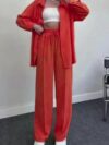 Model wearing a vibrant wide leg pants set perfect for spring The set features a flowy comfortable fit in a breathable polyester fabric