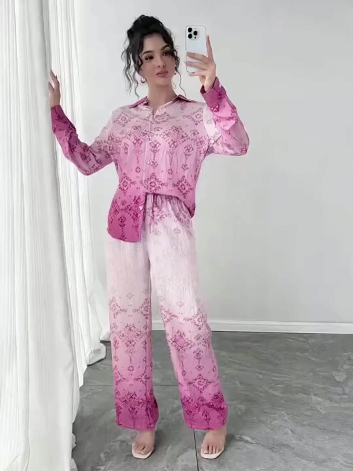 Stylish womens Dubai Nights Printed Pants Set from Newness Flattering wide leg pants and a coordinating top in a vibrant Middle Eastern inspired print Perfect for evening events or a chic daytime look