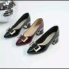 Womens black Mary Jane heels with gold buckle straps and chunky mid heel