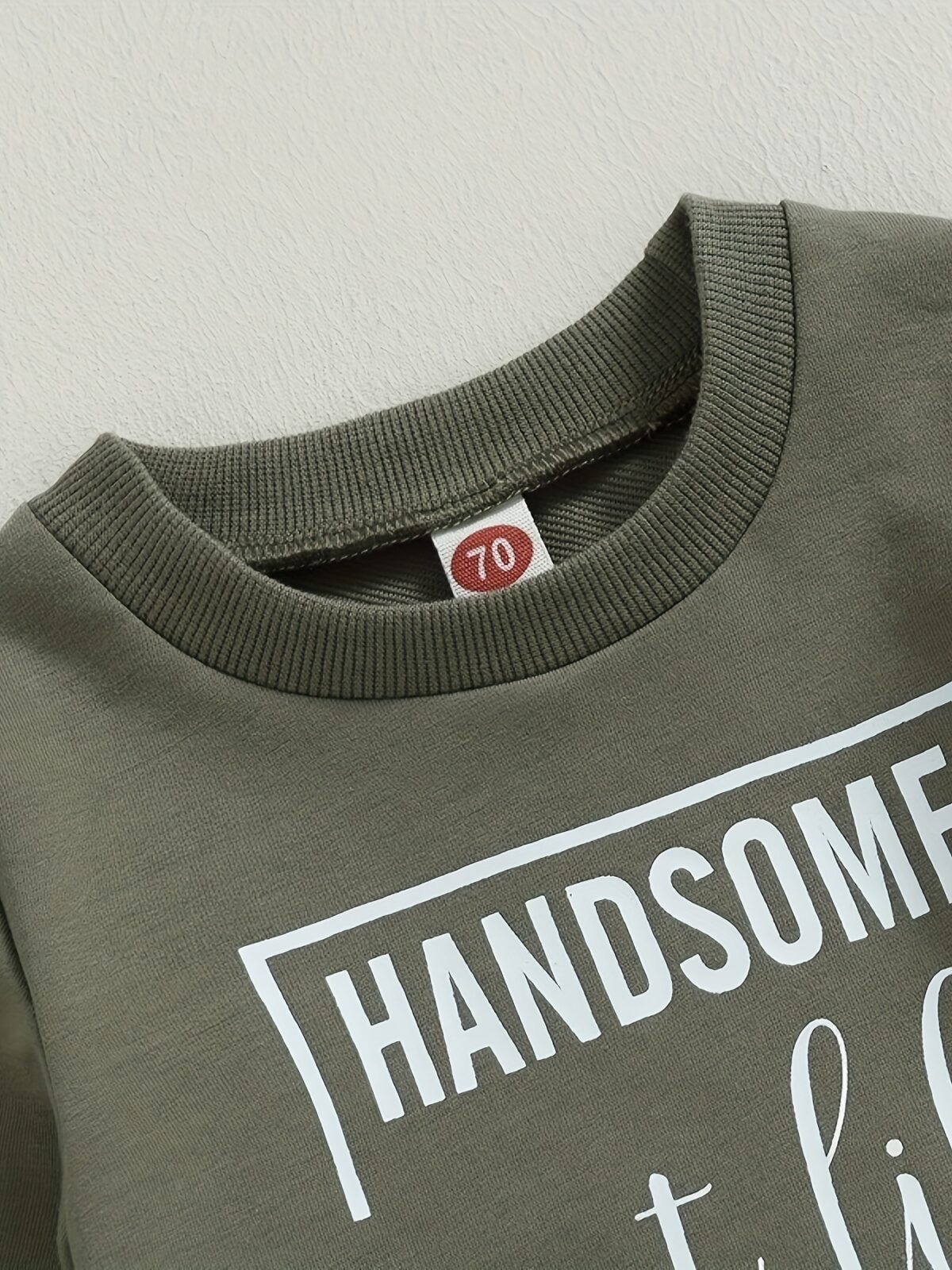 Stylish boys letter print sweatshirt and pants set in grey perfect for spring and fall The comfortable crew neck sweatshirt features a trendy letter print and is paired with matching pants
