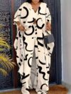 The Newness Casablanca Abstract Print Suit a chic modern two piece set perfect for any occasion Showcasing a stylish abstract print