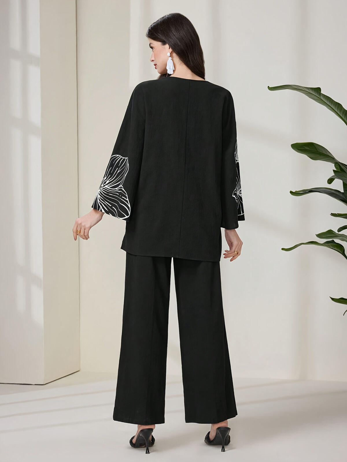 Embrace the autumn season in style with Newnesss Autumn Bloom Floral Print Set This chic two piece ensemble features a soft polyester fabric and a beautiful floral print perfect for effortless autumn fashion