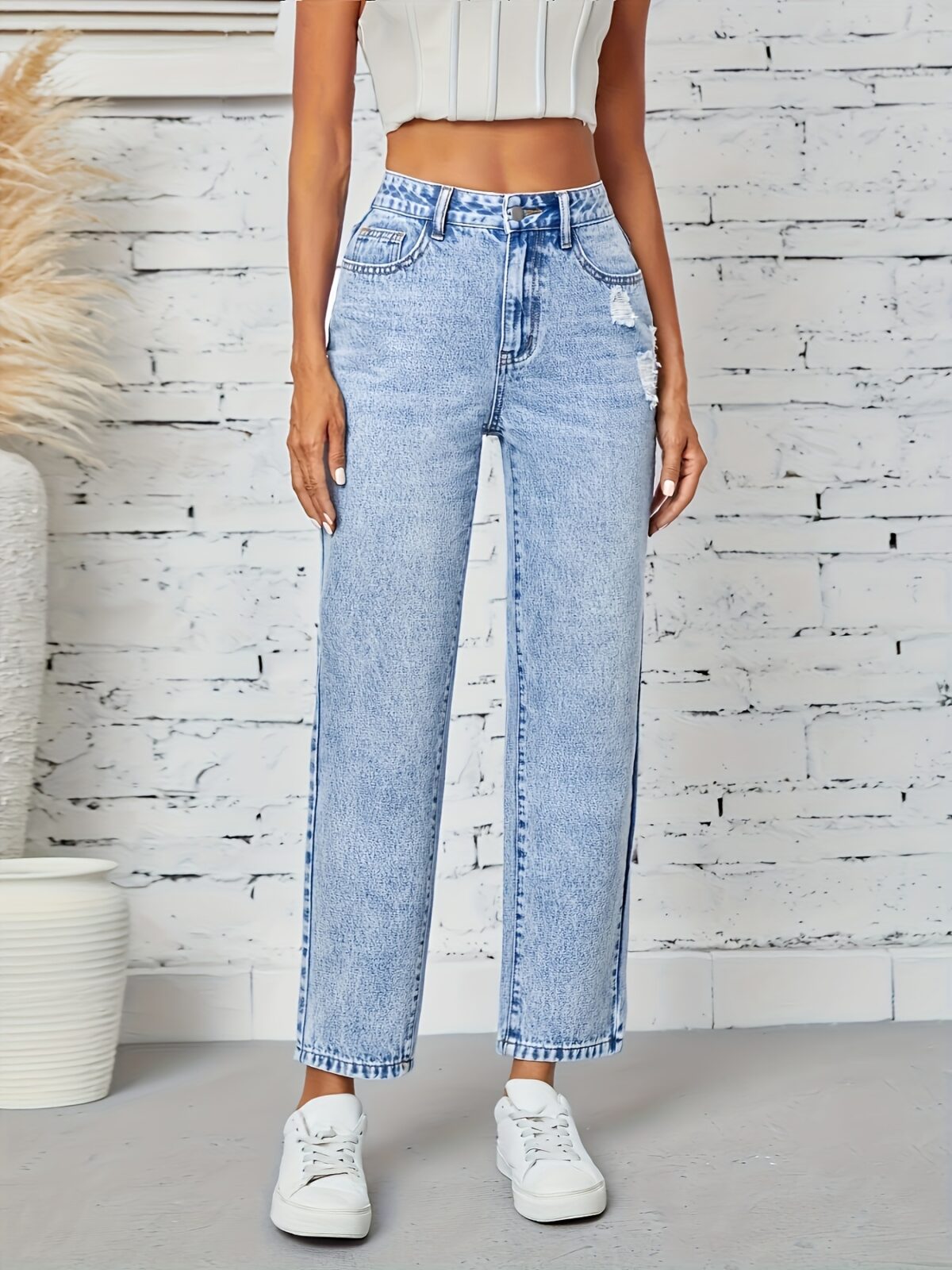 Flatlay of Newness Parisian Chic Classic Straight Leg Jeans showcasing the premium denim and perfect straight leg fit