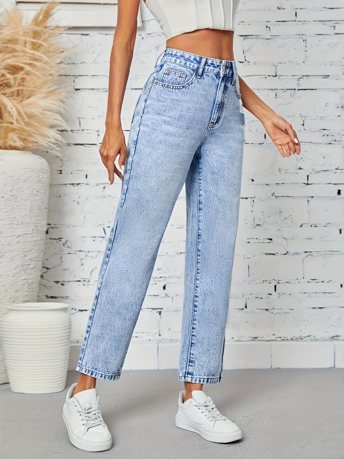 Flatlay of Newness Parisian Chic Classic Straight Leg Jeans showcasing the premium denim and perfect straight leg fit