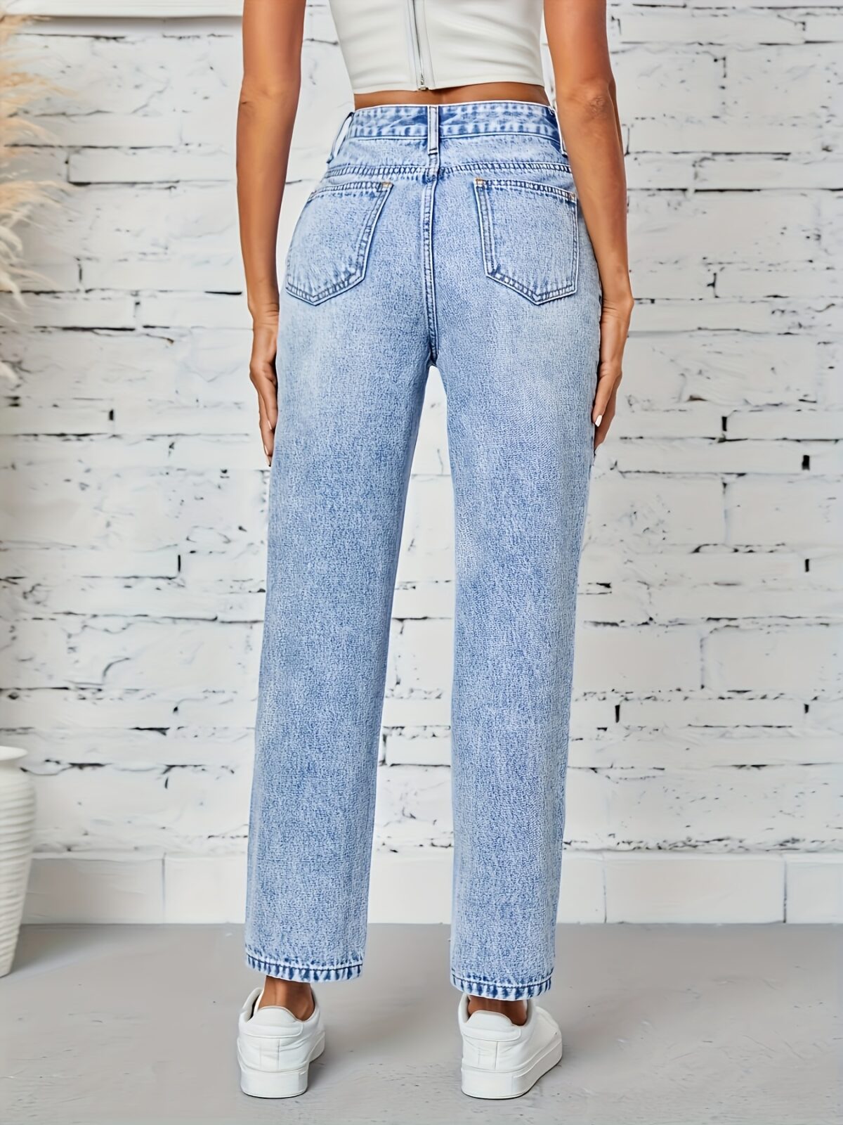 Flatlay of Newness Parisian Chic Classic Straight Leg Jeans showcasing the premium denim and perfect straight leg fit