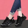 Newness Cityscape Casual Sport Sneakers showcasing all season comfort and a chic modern design The sneakers are shown on a models feet highlighting the style and detailing