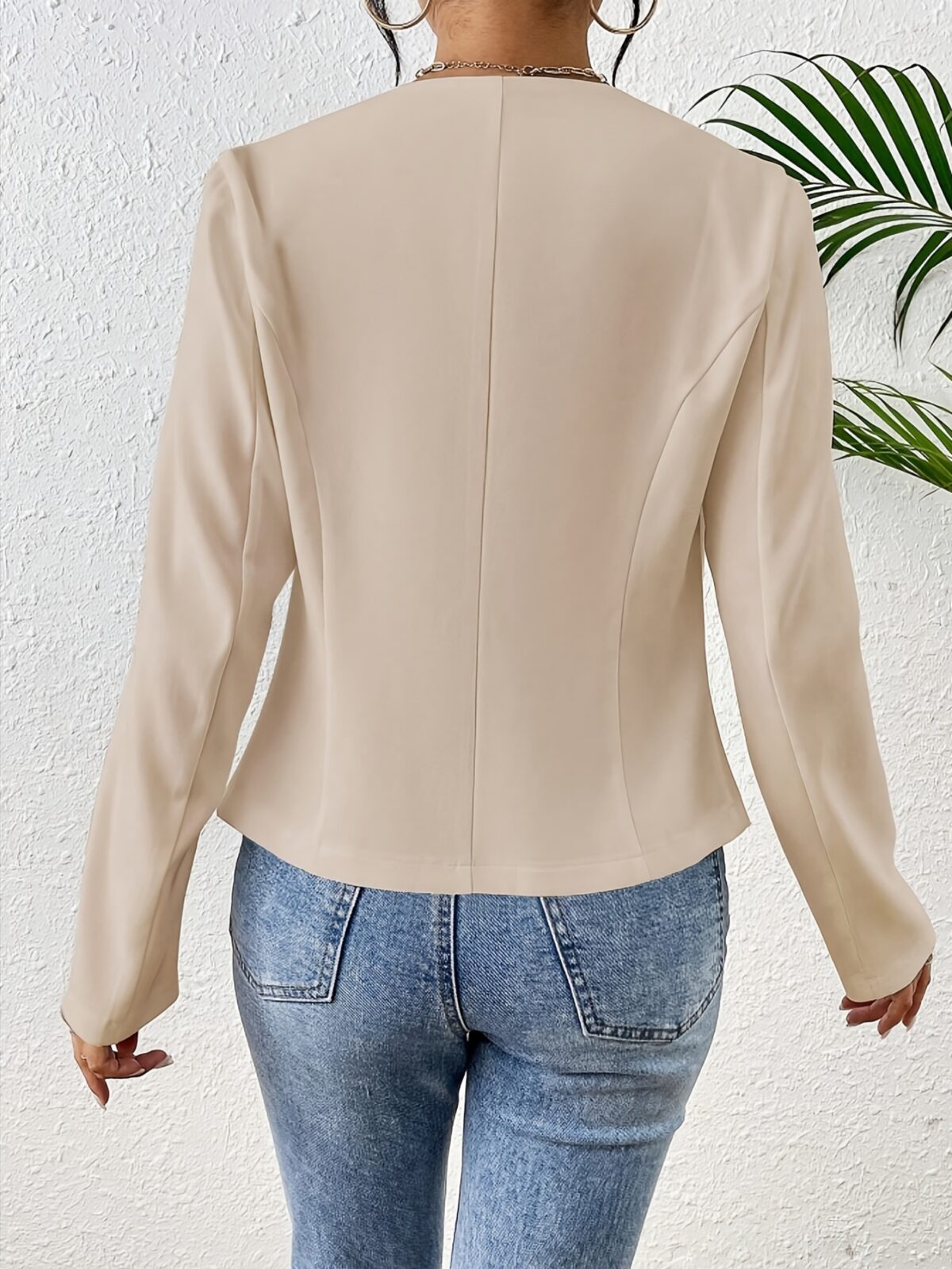 Flattering beige blazer for women featuring a chic asymmetrical hem perfect for both casual and formal occasions