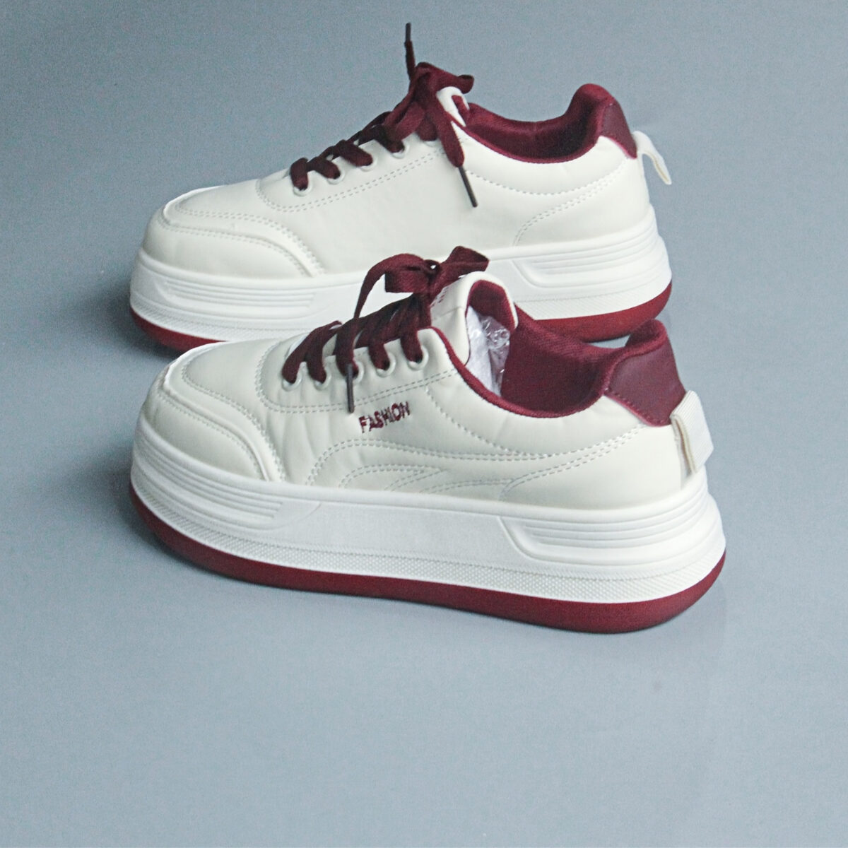 Newness white thick sole sneakers Chic comfortable and effortlessly cool footwear for everyday wear