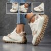 Elevate your look with Newness Elevated Edge Chunky Platform Sneakers These retro inspired sneakers feature a chunky platform sole and modern comfort perfect for adding a stylish edge to any outfit