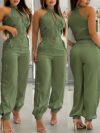Model wearing the Sahara Sunset Beige Zipper Jumpsuit a flattering beige jumpsuit perfect for spring and summer The jumpsuit features a zipper closure and a chic effortless silhouette