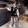 Stylish Newness Girls Varsity Outfit A trendy letter block cardigan and pleated skirt in a sporty chic design