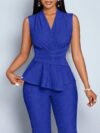 The Newness Milan Ruched Wide Leg Pants Set in a flattering pose showcasing its sophisticated design and chic style Perfect for an evening event