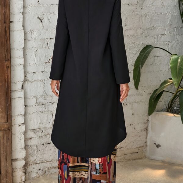 Model showcasing the Newness Casablanca Abstract Print Set a stylish two piece outfit with a solid color top and vibrant abstract print pants