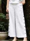 The Newness Botanical Embroidered Vest Suit in a flattering pose Showcasing the intricate embroidery and chic design
