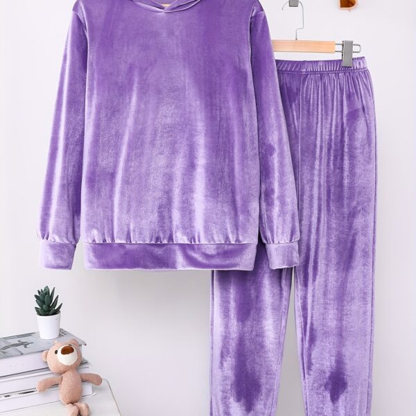 Indulge in ultimate comfort with the Newness Luxe Lounge Velvet Hooded Set. This luxurious loungewear set features a plush velvet fabric and a flattering hooded design, perfect for relaxing at home or running errands in effortless style.