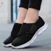 Womens wide fit sneakers with adjustable straps soft fabric upper and breathable design in color