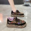 Elevate your style with Newnesss Elevated Rhinestone Platform Sneakers These hand stitched sneakers feature genuine gemstones and a chic platform sole