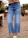 Newness Effortless Chic Straight Leg Jeans with Raw Hem A flattering pair of straight leg jeans in premium denim featuring a trendy raw hem