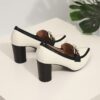 Newness Metropolitan Flair Two Tone Block Heels Chic two tone block heels perfect for elevating any outfit Experience comfort and style