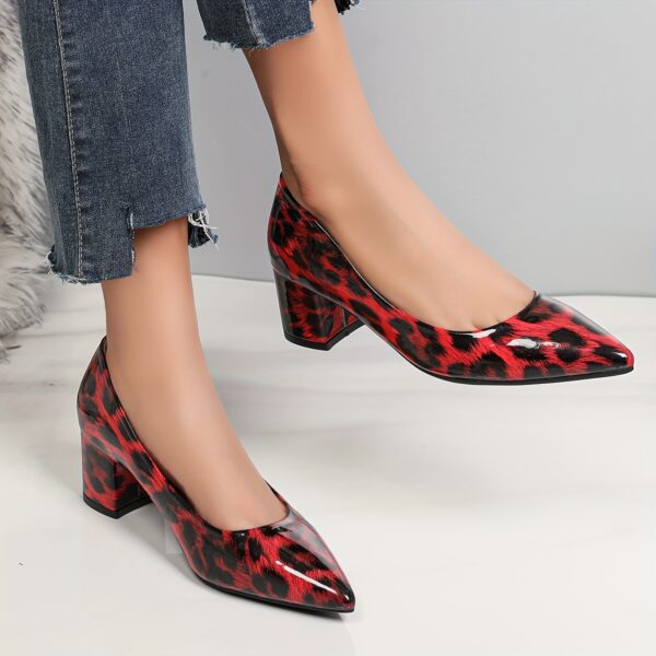 Newness Fierce Red Leopard Block Heel Pumps These chic pumps feature a striking red leopard print and a comfortable block heel perfect for any occasion