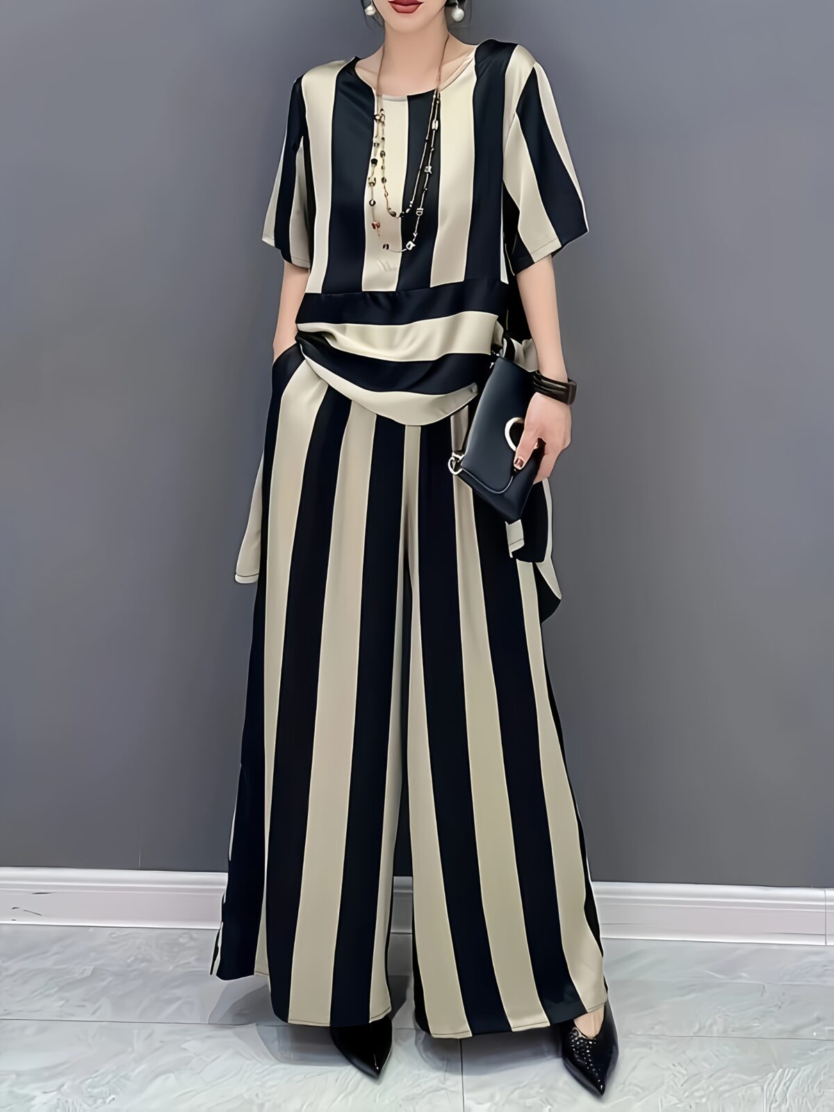 The Newness Cairo Striped Two Piece Set A stylish and versatile two piece outfit perfect for any occasion Featuring a chic striped pattern and modern design