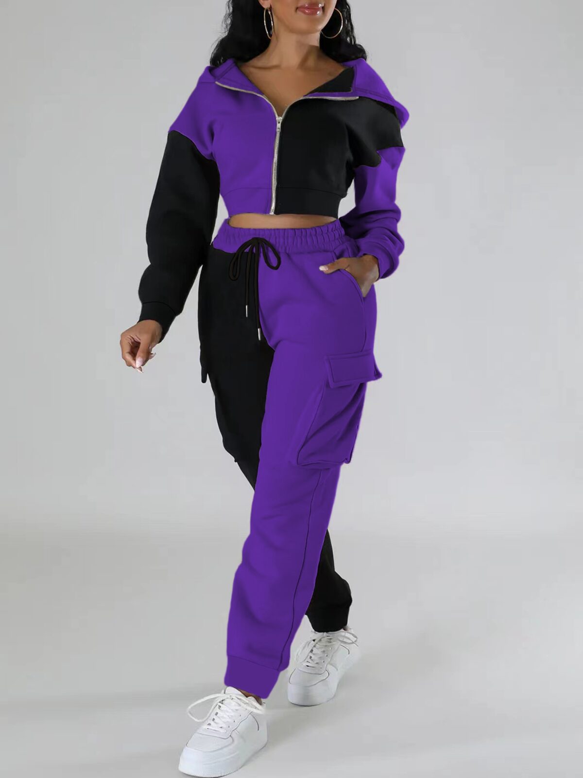 Model wearing the Newness Milan Color Block Tracksuit showcasing its comfortable fit and modern color blocking design