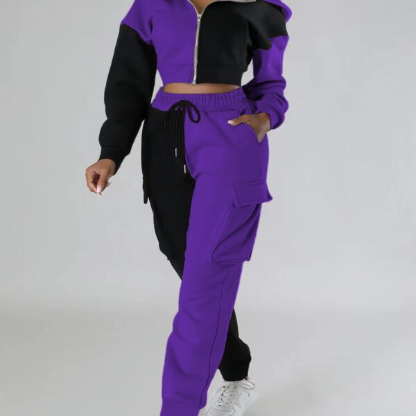 Model wearing the Newness Milan Color Block Tracksuit, showcasing its comfortable fit and modern color blocking design.