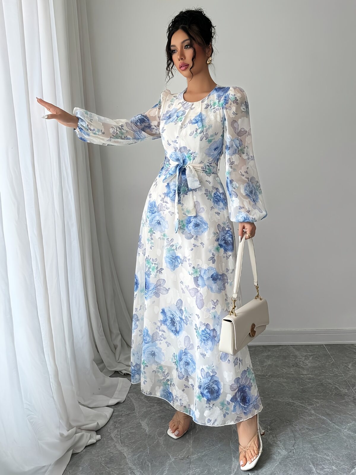 Effortlessly elegant Azure Bloom floral print maxi dress perfect for spring and autumn Features a chic print and flattering silhouette