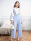 Girl wearing a whimsical floral print outfit ideal for spring and autumn