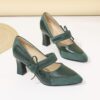 A pair of retro style embroidered womens high heel shoes in a pointed toe design