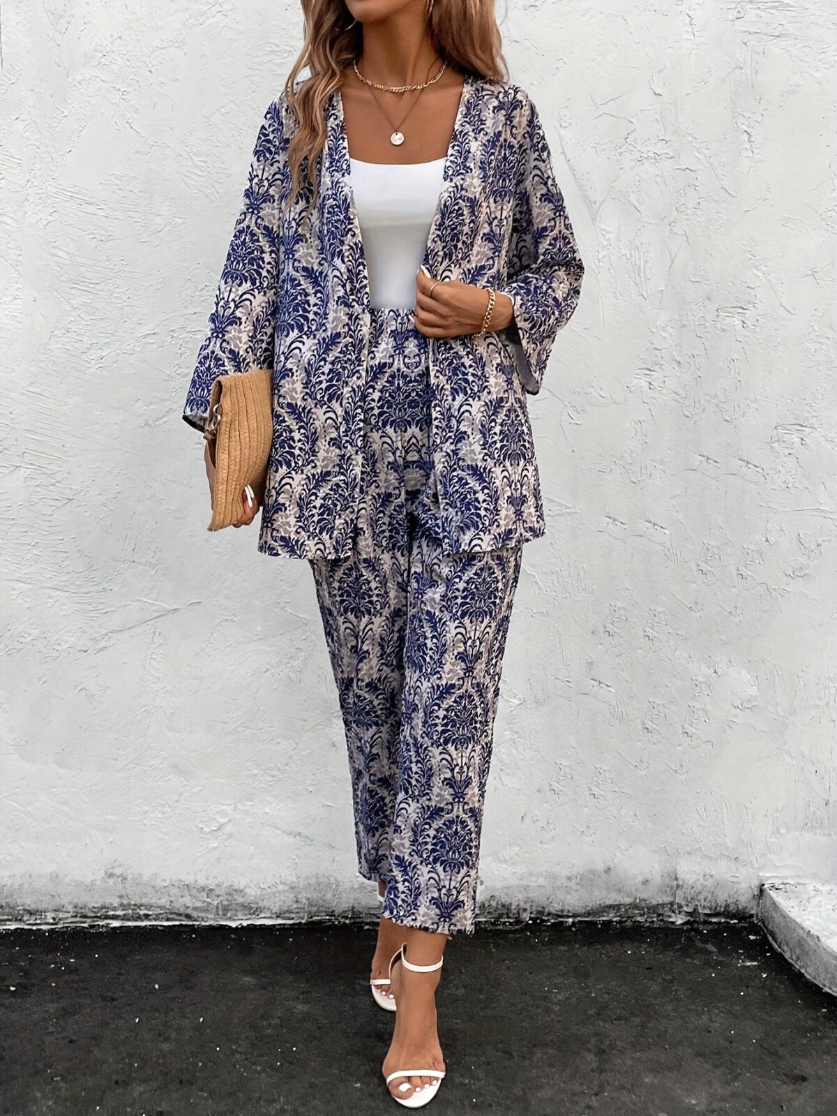 Embrace the vibrant energy of Dubai with the Newness Dubai Nights Print Maxi Dress This elegant polyester and elastane blend maxi dress features a chic all over print perfect for springsummer
