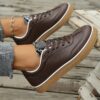 Newness Urban Edge Retro Snake Sneakers Chic and comfortable sneakers with a retro snake print design perfect for any occasion
