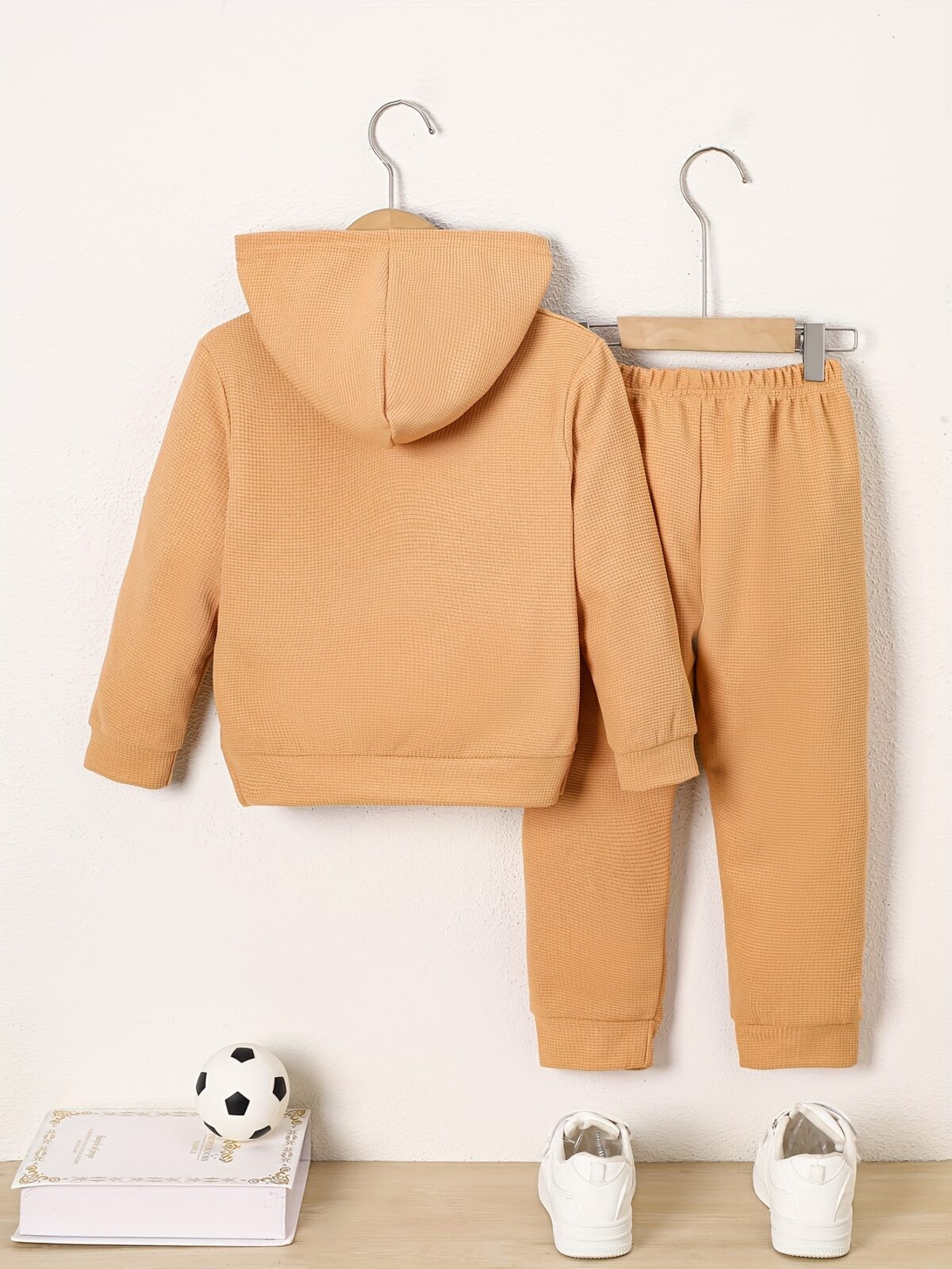 Newness Cozy Champ Boys Waffle Knit Set in soft waffle knit fabric featuring a hooded top and pants perfect for winter adventures