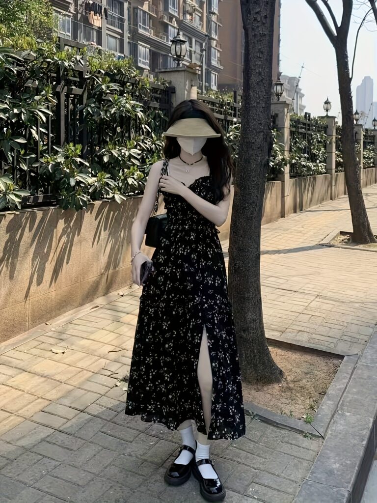 Effortlessly chic Newness Midnight Bloom Floral Print Dress in a flattering ruched bodice with a stylish side slit, perfect for summer.
