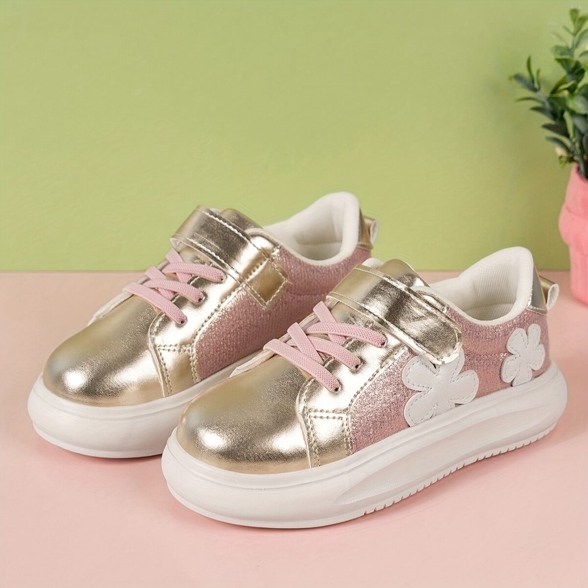 Adorable girls pink and white floral sneakers perfect for play or everyday wear Twinkle Toes brand