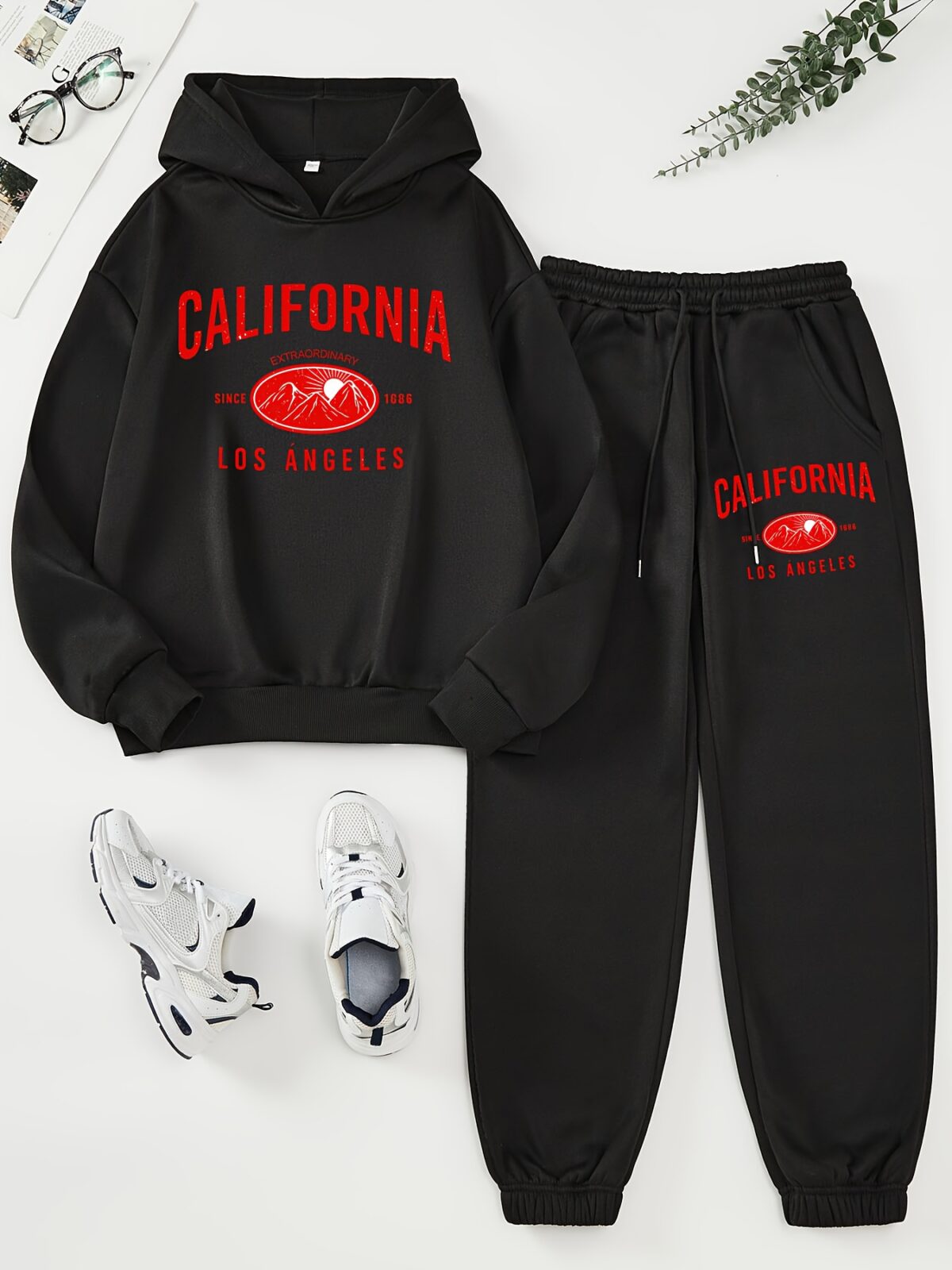 Stay cozy and stylish in the Newness Sunset Boulevard California Print Hoodie  Sweatpants Set Fleece lined for ultimate comfort this chic set features a vibrant California print