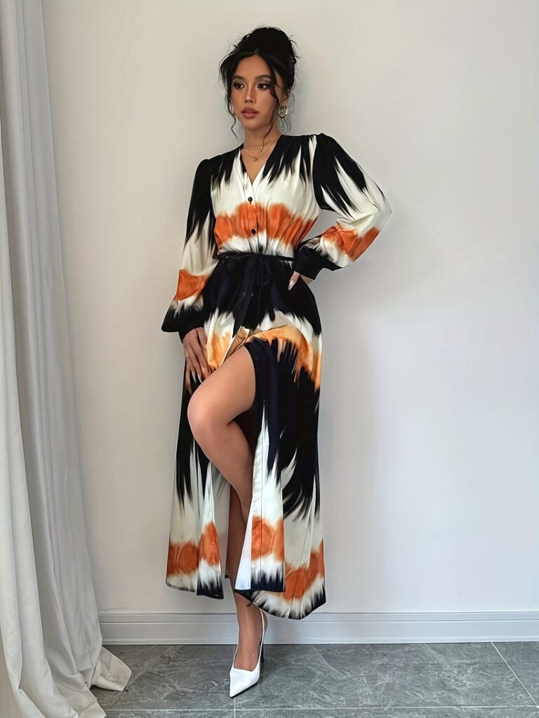 Casablanca Color Block Maxi Dress from Newness. Flattering maxi dress in a color block design.