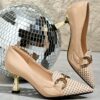 Newness Houndstooth Chain Buckle Stilettos Pointed toe heels in a chic houndstooth pattern with a sophisticated gold chain buckle Perfect for adding a touch of elegance to your party or nightclub outfit