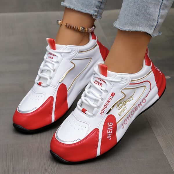 Newness City Chic Striped Athletic Sneakers Stylish striped sneakers perfect for everyday wear Close up view showcasing the chic design and comfortable athletic build