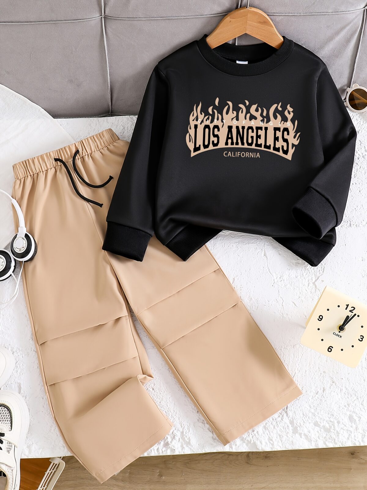 Stylish and cozy boys fleece lined sweatshirt set in trendy letter pattern perfect for cooler weather Two piece outfit includes sweatshirt and sweatpants
